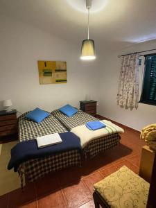 萨尔瓦特拉都伊克姆Casa Vinte的双床间设有2张单人床。