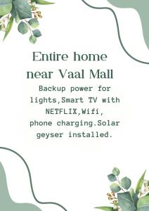 范德拜尔帕克Vaal Self Catering close to Vaal Mall and Aquadome的白色背景的绿色叶子和花的框架