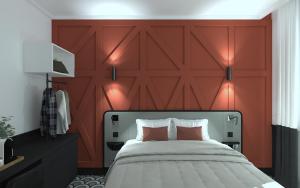 第戎Logis Hotel Darcy Dijon Centre的一间卧室配有红色的大床头板和一张床