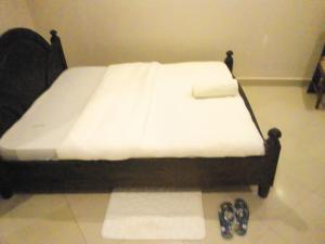 Suzie hotel Kampala hotel客房内的一张或多张床位