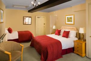 马尔堡阿姆斯酒店客房内的一张或多张床位
