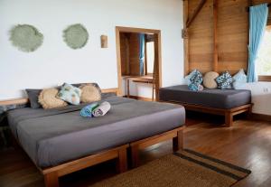 Villa Mentawai客房内的一张或多张床位
