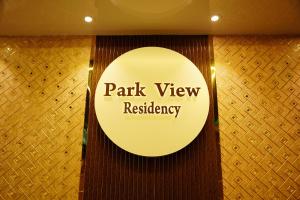 蓬蒂切里Park View Residency的公园景公寓的标志