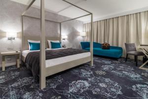 马丁迪拉克城堡酒店客房内的一张或多张床位