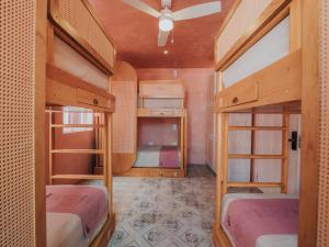 Casa Amate 61 Boutique Hostel客房内的一张或多张床位