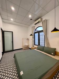 Homestay Beach View 2客房内的一张或多张床位