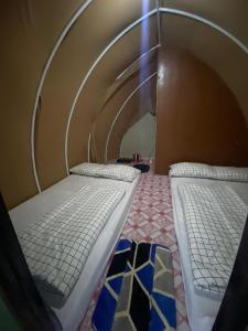 Pandawa camp客房内的一张或多张床位