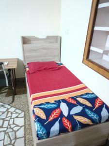 Pratima Boys Pg客房内的一张或多张床位