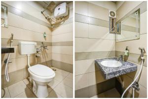 布巴内什瓦尔Super Collection O 75732 Hotel Aatithya的一间带卫生间和水槽的浴室