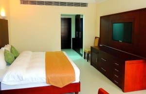 索哈尔海滩酒店客房内的一张或多张床位