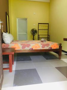 Serene Inn Kandana客房内的一张或多张床位