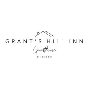 布隆方丹Grants Hill Inn的家具商店的标志,背景是房子