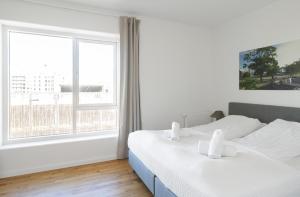 Luxurios 3-bed w balcony and great views客房内的一张或多张床位