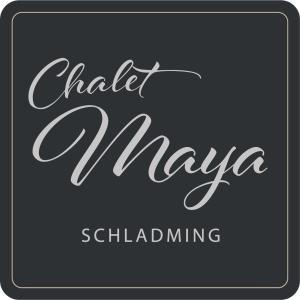 斯拉德明Chalet Maya的一种能读到粉笔花花花花的稳定标志