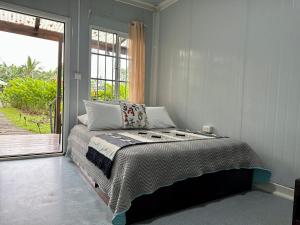 Almendros Eco-Villas客房内的一张或多张床位