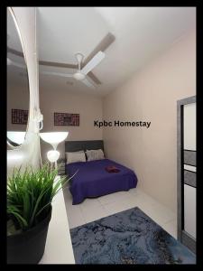 Kpbc Homestay 3bilik客房内的一张或多张床位