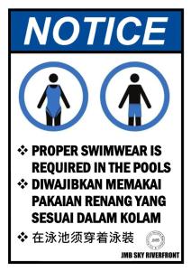 哥打巴鲁Prestige Troika Luxury Stay的游泳池内需要读到合适的泳装的标志