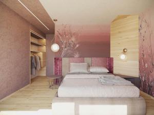 莫埃纳Flos Hotel的一间卧室配有一张床和粉红色的墙壁