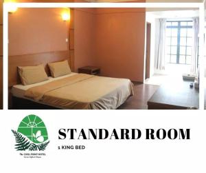丹那拉打Cool Point Hotel的标准间设有1间带1张床的卧室