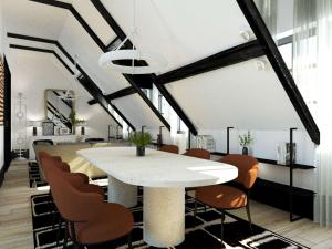 雷恩Balthazar Hôtel & Spa Rennes - MGallery Hotel Collection的一间配备有白色桌椅的用餐室