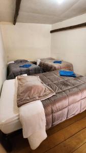 Munay Cusco客房内的一张或多张床位