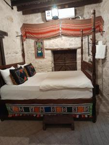 نزل كوفان التراثي Koofan Heritage Lodge客房内的一张或多张床位