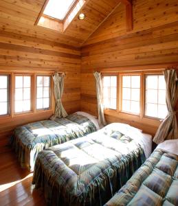Hakuba Brownie Cottages客房内的一张或多张床位
