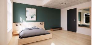 HolebyAiden by Best Western Lolland的一间卧室设有一张床和绿色的墙壁