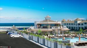奥甘奎特安克雷奇海滨酒店的享有带游泳池和大楼的度假村景色
