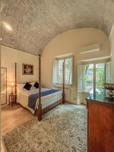 佛罗伦萨佛罗伦萨艺术公寓的卧室配有一张床