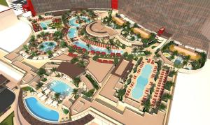拉斯维加斯Las Vegas Hilton at Resorts World的享有带游泳池和滑梯的度假村的顶部景致