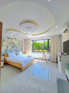 Apec Sunsea Condotel Phu Yen客房内的一张或多张床位