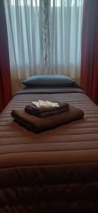 Casa céntrica compartida客房内的一张或多张床位