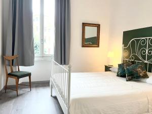 ComeCasa near Piazza Vittorio 2 Bedrooms客房内的一张或多张床位