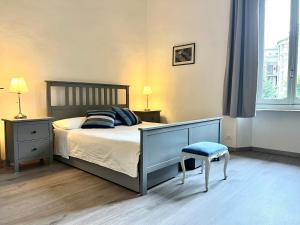 ComeCasa near Piazza Vittorio 2 Bedrooms客房内的一张或多张床位