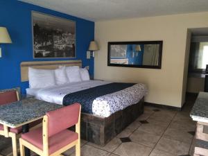 博蒙特美洲最佳价值客栈客房内的一张或多张床位