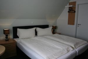 维特韦尔酒店客房内的一张或多张床位