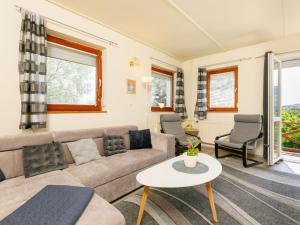 BadacsonyHoliday Home Toth - BAC109 by Interhome的客厅配有沙发和桌子