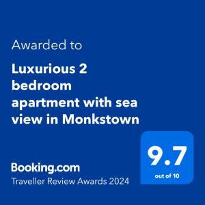 布莱克罗克Luxurious 2 bedroom apartment with sea view in Monkstown的带有文字的电话的屏幕,升级到豪华的海景卧室公寓