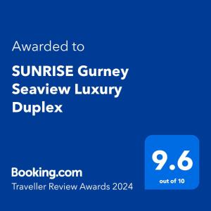 乔治市SUNRISE Gurney Seaview Luxury Duplex的一部手机的屏幕,上面的文字被授予日出雕像