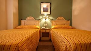 洛斯巴尔托洛斯酒店客房内的一张或多张床位