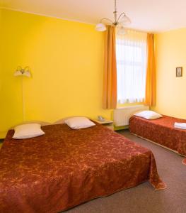 威玛加酒店客房内的一张或多张床位