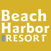 斯特金贝Beach Harbor Resort的海滩港湾度假村的白色标志