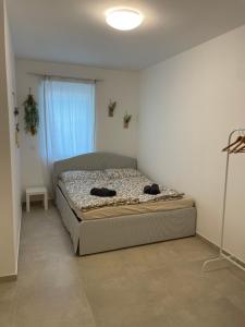 Langenzersdorf Apartment客房内的一张或多张床位