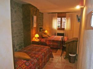 Casa Rural Cal Xico客房内的一张或多张床位