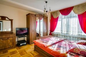 Apartment on Voroshilovskiy客房内的一张或多张床位