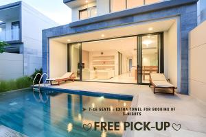 岘港"BRG GOLF CLUB" - Danang Private Pool Villa 3 bedrooms #3的房屋前的游泳池