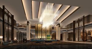 石狮石狮明昇铂尔曼酒店的装饰着吊灯的大堂的 ⁇ 染