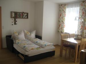 Appartement Alpenglück客房内的一张或多张床位