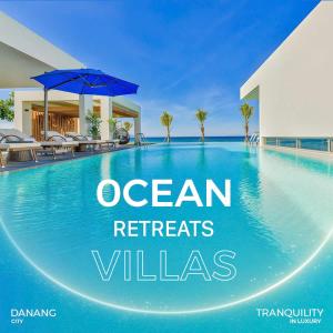 岘港Ocean Retreats Villas Danang的游泳池的形象,加上海洋度假别墅的词句